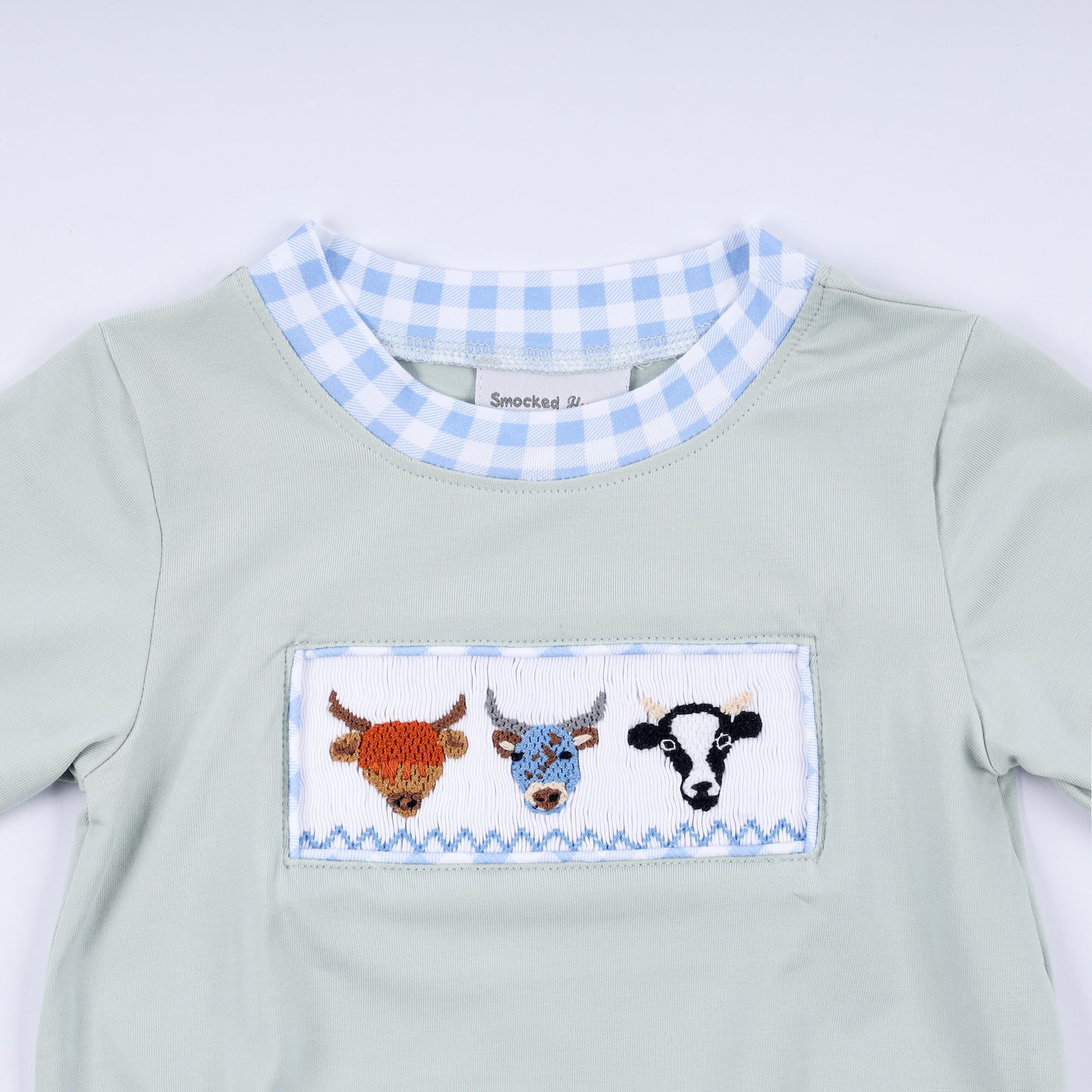 Sage cow hand smocked bubble