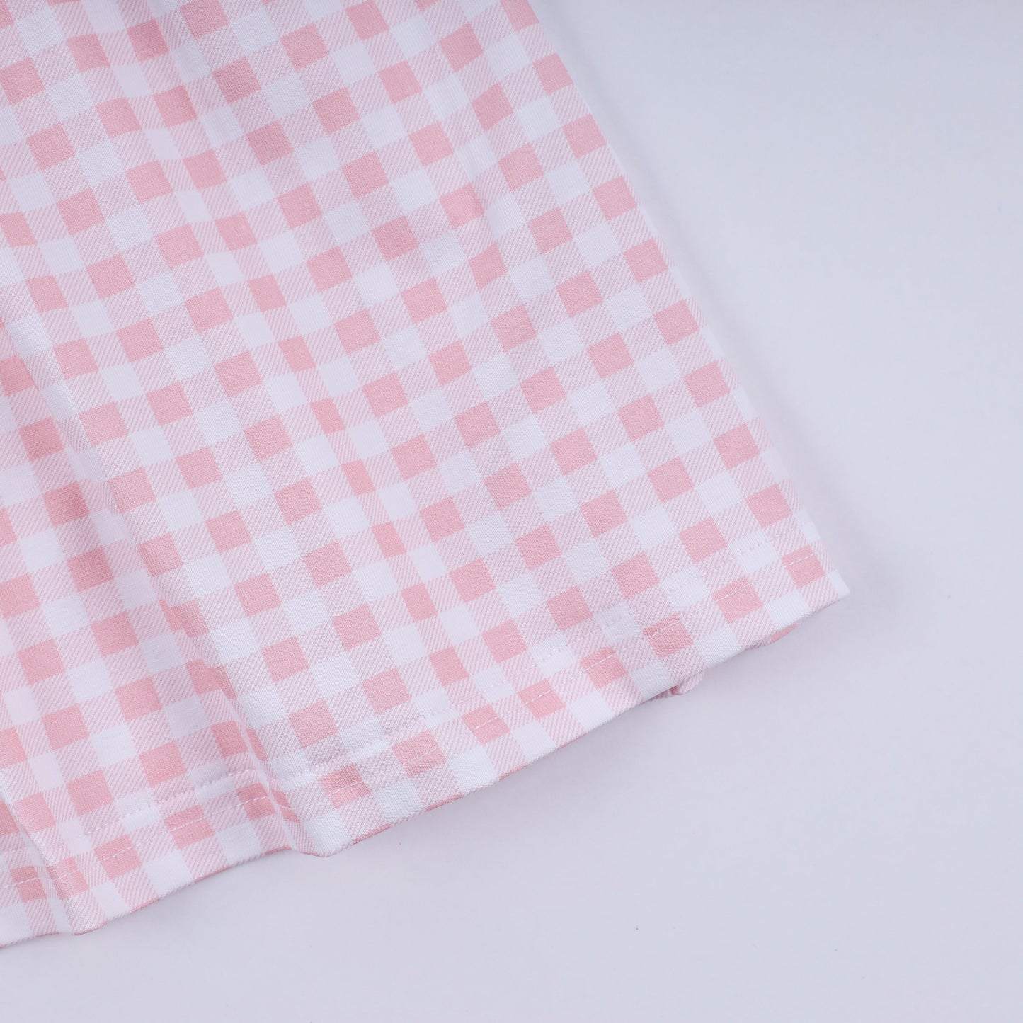 Pink character hand smocked gingham ruffle dress